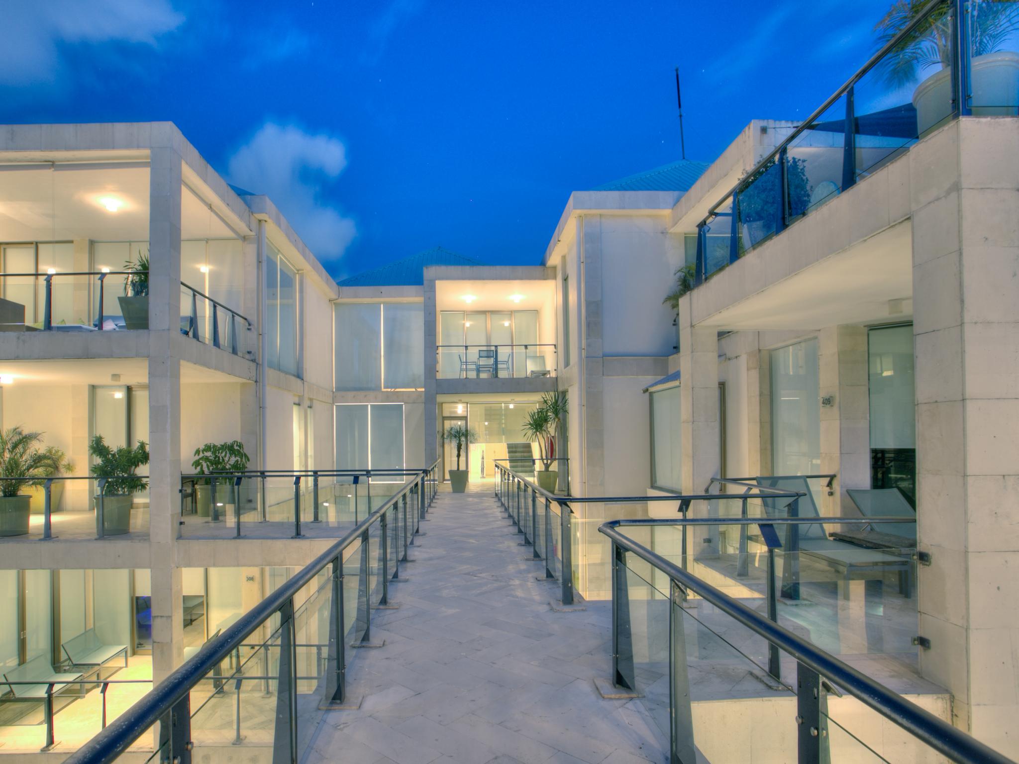 Furamaxclusive Ocean Beach Seminyak Bali Legian  Exterior photo The hotel at night